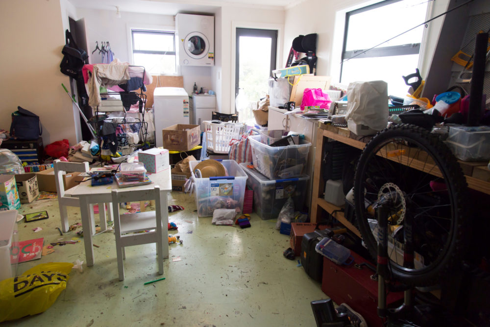 A messy space in need of a hoarder cleanout service from Junk Masters