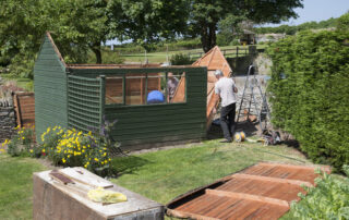 A shed in the process of being removed