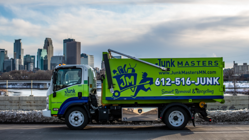 A Junk Masters truck ready to haul junk from a junk removal service in minneapolis, mn