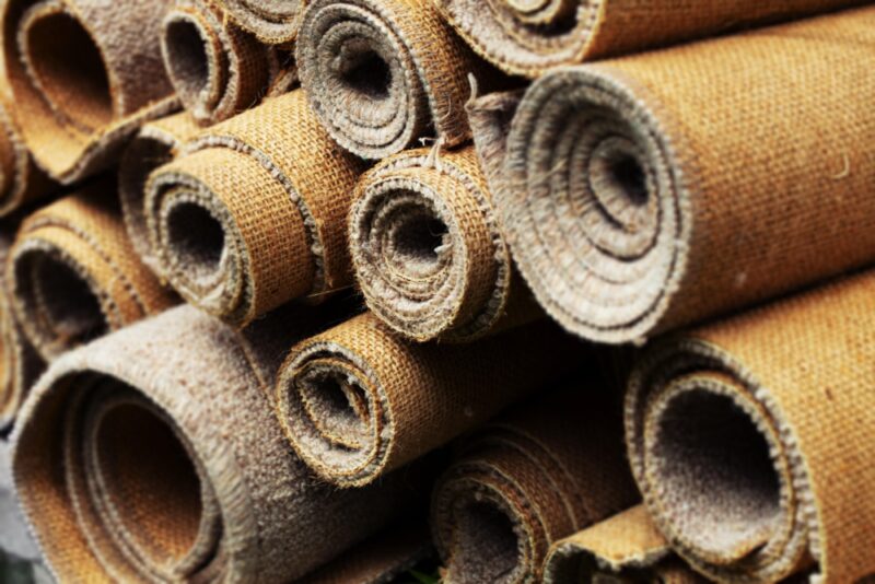 Rolls of carpet that can be removed with a carpet removal service from Junk Masters